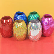 Multicolor curling ribbon rolls displayed for festive party decorations.