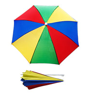 A colorful DrizzlePro umbrella is shown open from above, with a folded version of the umbrella below it on a white