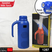 Compact wireless Bluetooth speaker with a convenient hand strap, ideal for carrying.